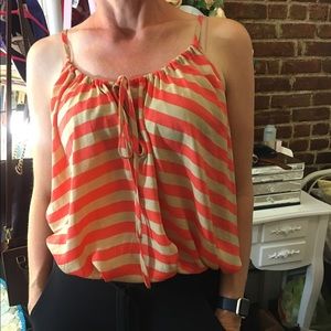 Orange and beige A-symmetrical float tank